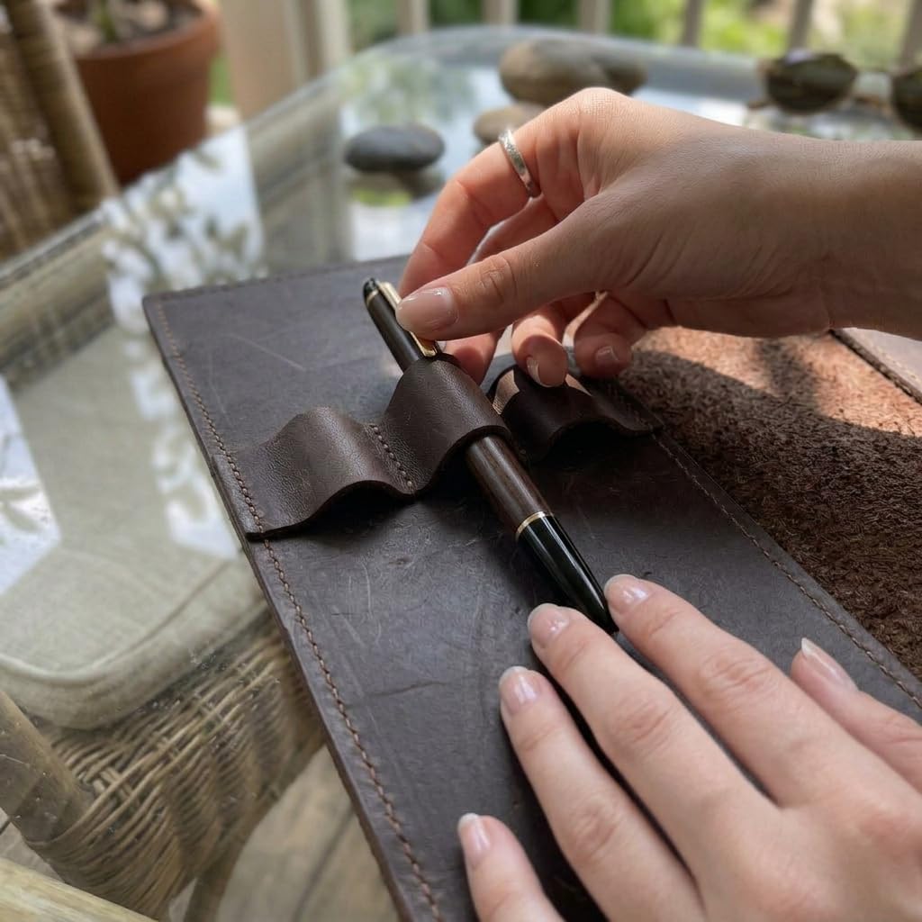 TORAKIP Leather Sketchbook Cover A5 ā Refillable Notebook Holder with Pen Loops & Strap Closure, Genuine Leather Journal Cover for Artists & Writers, Fits 5.8" x 8.3" (Paper Not Included), Brown