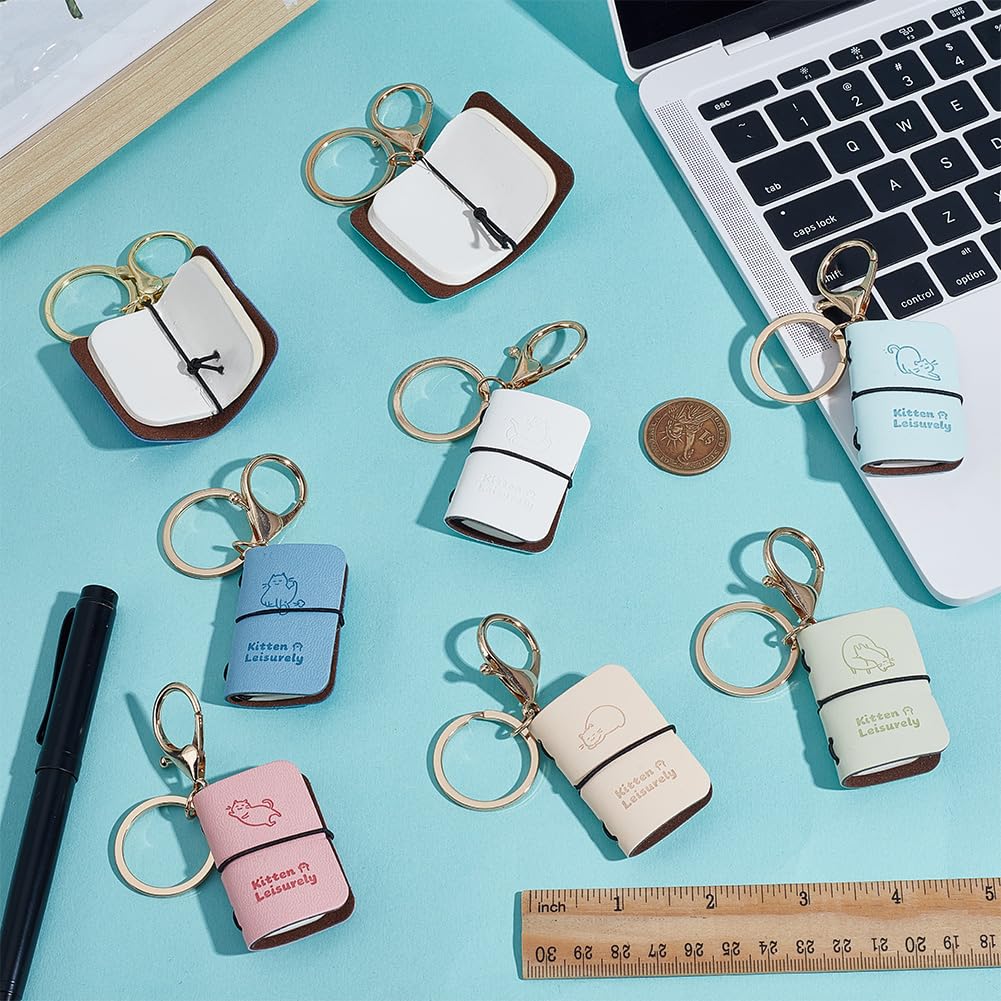 WEBEEDY 8 Styles Mini Tiny Journal Notebook Leather Keychain Diary Multicolor Pocket Planner for Travelers Office Use Unique Gifts Accessories, 1.4x2 Inch/3.5x5.2 cm