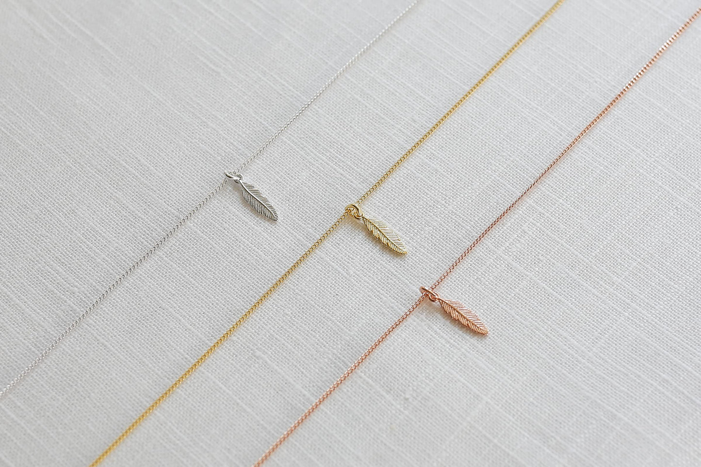 LUUK LIFESTYLE Necklace with feather pendant, 925 sterling silver chain and pendant, modern and minimalist fashion accessory, layer look, trendy boho style, jewelry gift idea for her, gold
