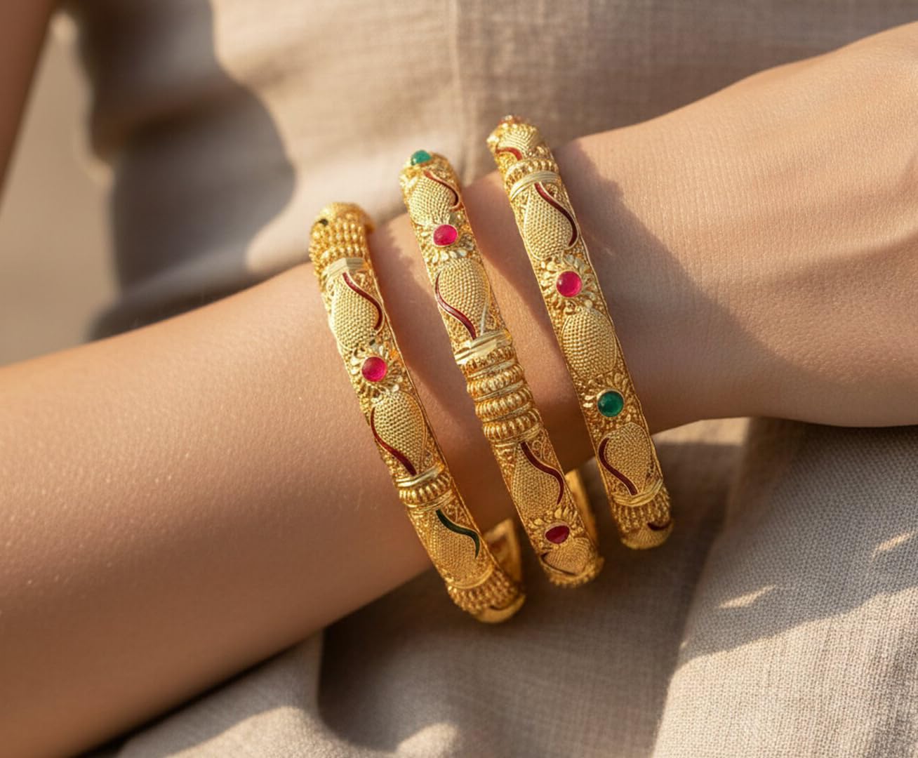 Touchstone "Golden Bangle Collection Indian Bollywood Desire Beautifully Carved Conch Shell Inspired Faux Ruby Emerald Thick Designer Jewelry Bangle Bracelets. Set of 4. in Gold Tone for Women.