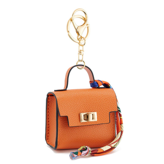 WOZEAH Mini Backpack Keychain for Women,Small Change Pouch Coin Purse Twist-lock with Key Headset Bag（Orange）