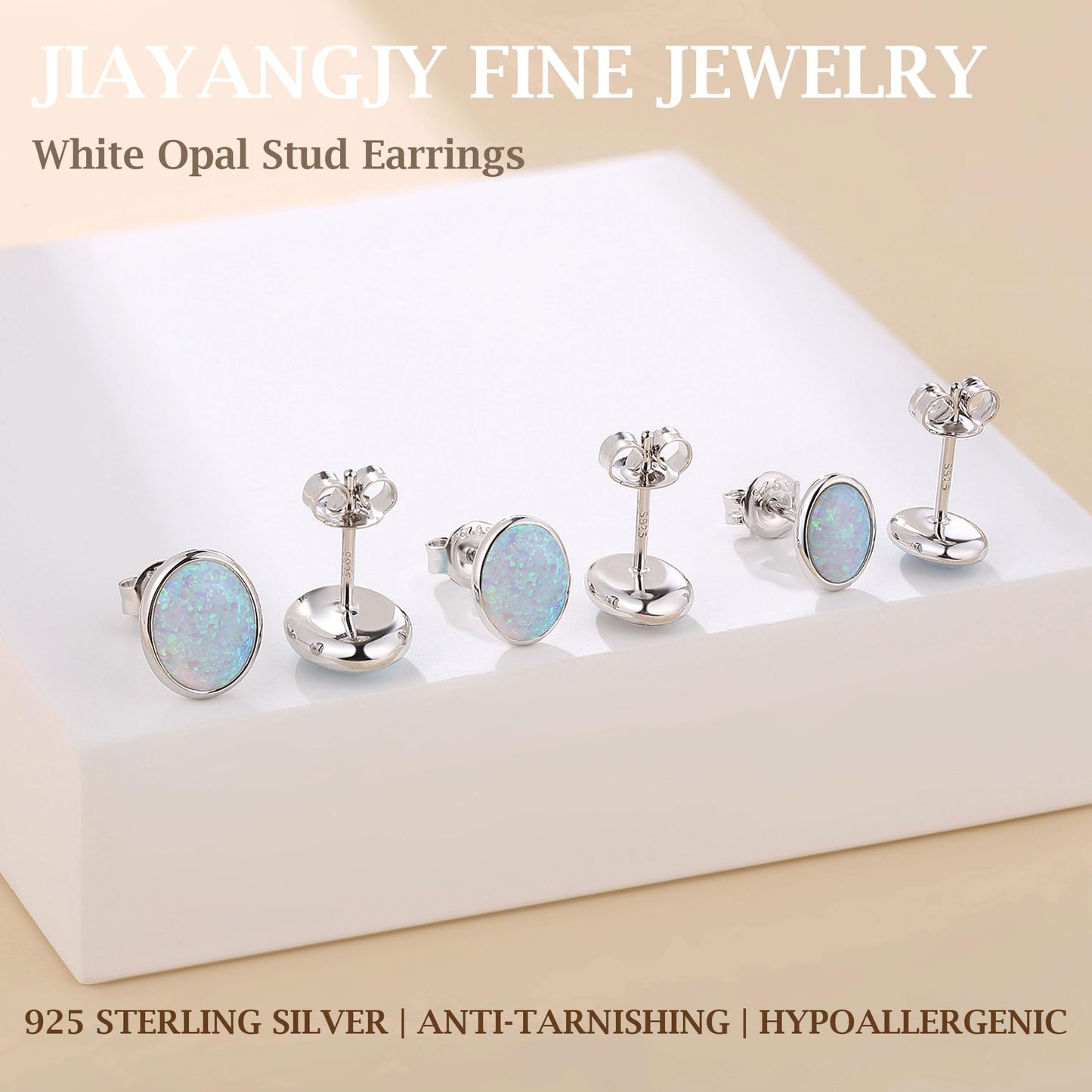 JiayangJY White Fire Opal Stud Earrings for Women 18K White Gold Plated Sterling Silver Oval Shape 7mm Opal Earrings with Push Back