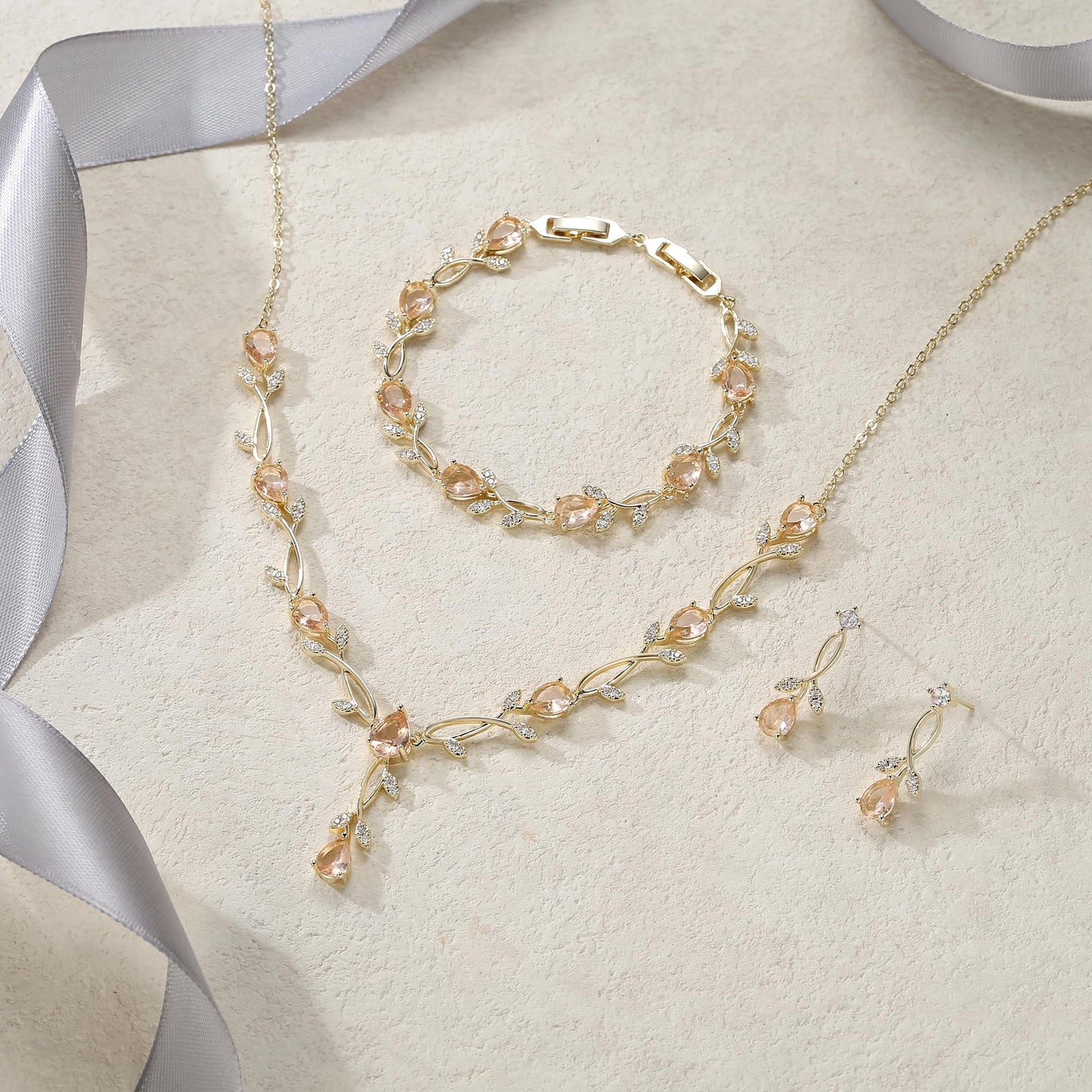 EVER FAITH Prom Party Jewelry Set for Bride Bridesmaid, Champagne Teardrop Cubic Zirconia Gold-Plated-Brass Leaf Vine Bridal Necklace Dangle Earrings Bracelet Sets for Women