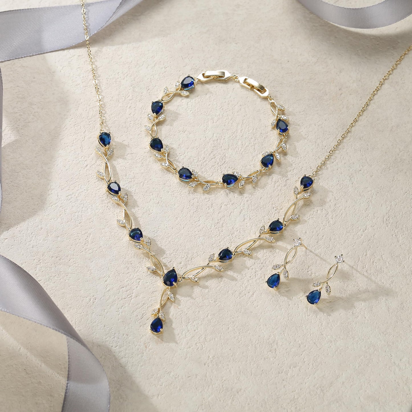 EVER FAITH Wedding Prom Jewelry Set for Bridesmaid, Blue Teardrop Cubic Zirconia Gold-Plated-Brass Bridal Party Necklace Dangle Earrings Bracelet Sets for Women Gift for Mother Friend Wife
