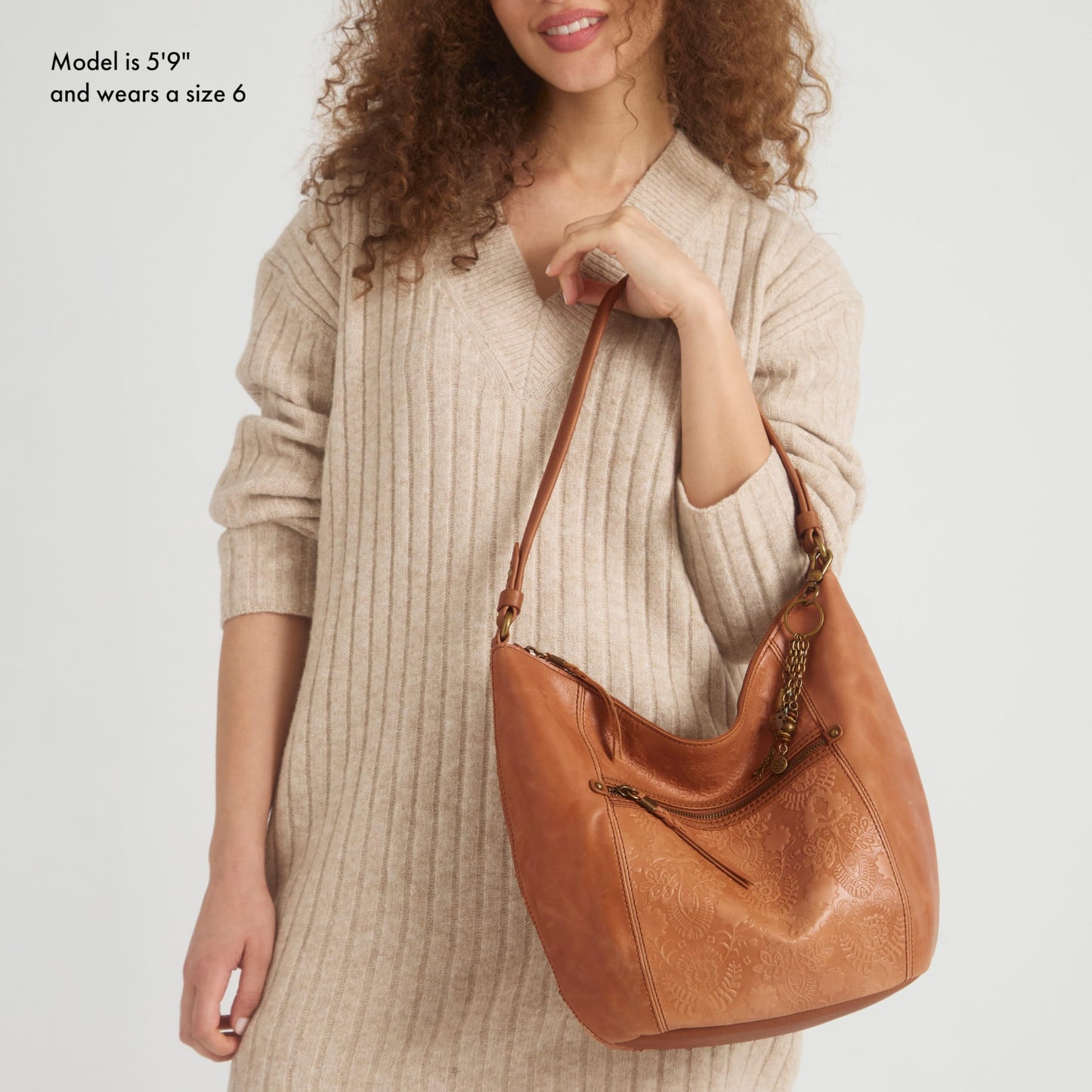 The Sak Sequoia Hobo Bag in Leather, Single Shoulder Strap, Tobacco Floral Emboss
