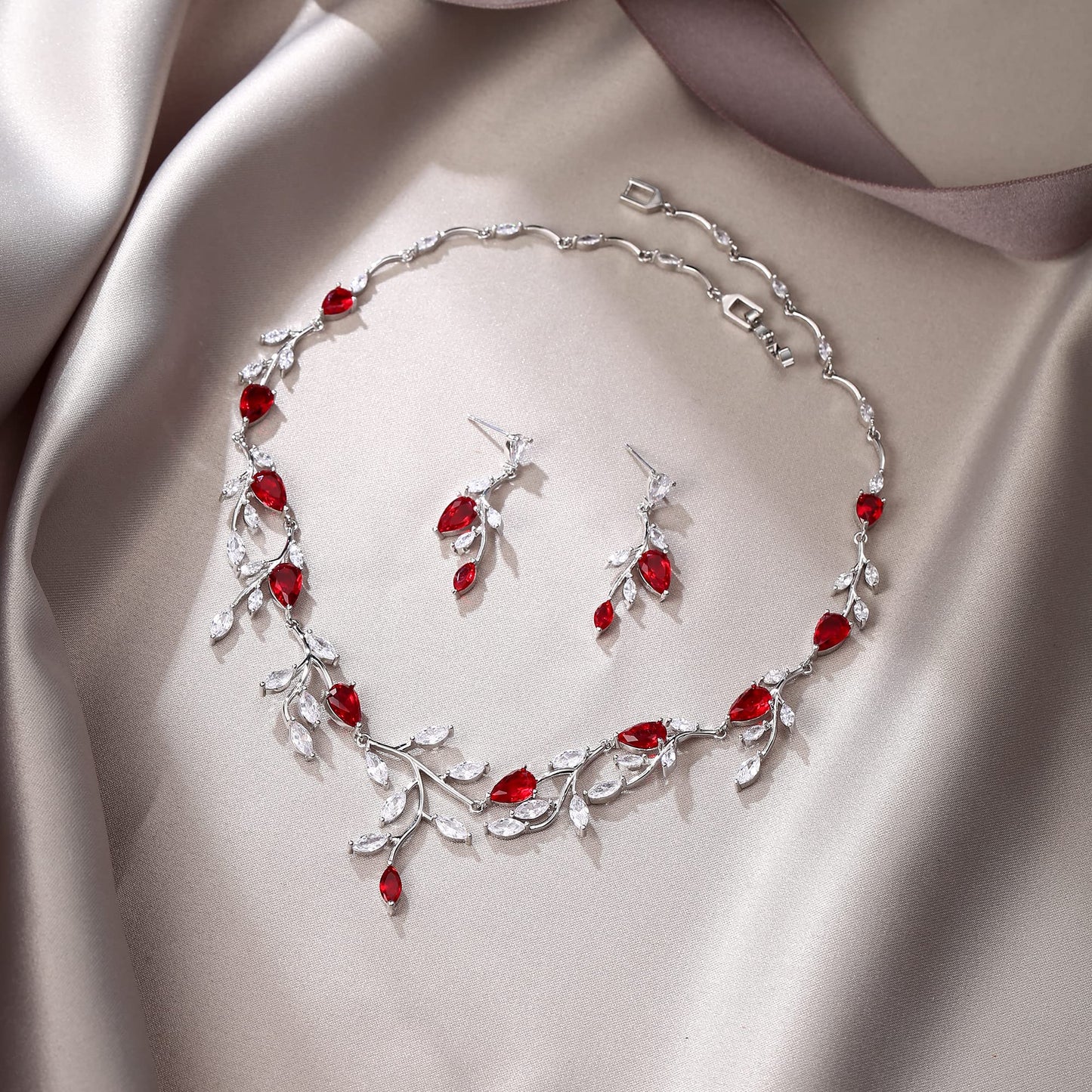EVER FAITH Wedding Jewelry for Bride Women Bridesmaid, Sparkly Red Cubic Zirconia Pear-Shaped Birthstone Leaf Necklace Earrings Set for Prom